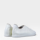 Yeossal white leather unlined GAT sneakers with perforated details and rubber soles.